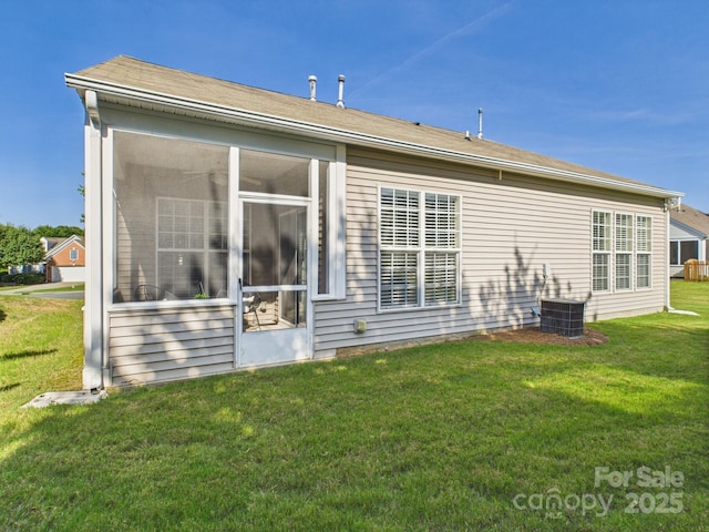 9030 Gander Dr, Charlotte, NC 28277 - rear view of house featuring a yard and a sunroom