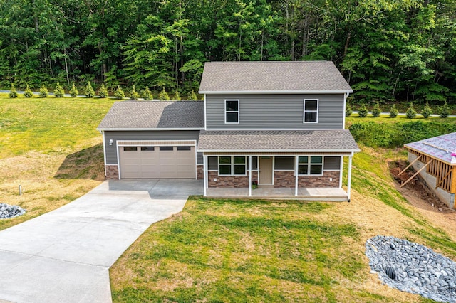 1214 Winter Pl SW, Lenoir, NC 28645 - traditional-style house featuring an attached garage, concrete driveway, a front yard, a shingled roof, and a porch