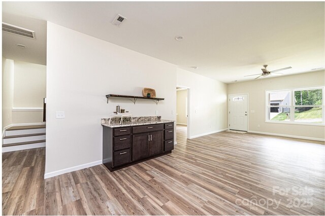 1214 Winter Pl SW, Lenoir, NC 28645 - bar featuring light wood-type flooring and a ceiling fan