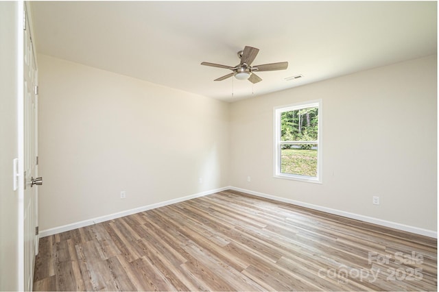 1214 Winter Pl SW, Lenoir, NC 28645 - empty room with ceiling fan and light wood-style flooring