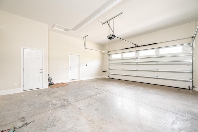 1214 Winter Pl SW, Lenoir, NC 28645 - garage with a garage door opener and baseboards