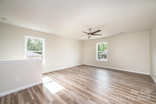1214 Winter Pl SW, Lenoir, NC 28645 - spare room featuring a ceiling fan and wood finished floors