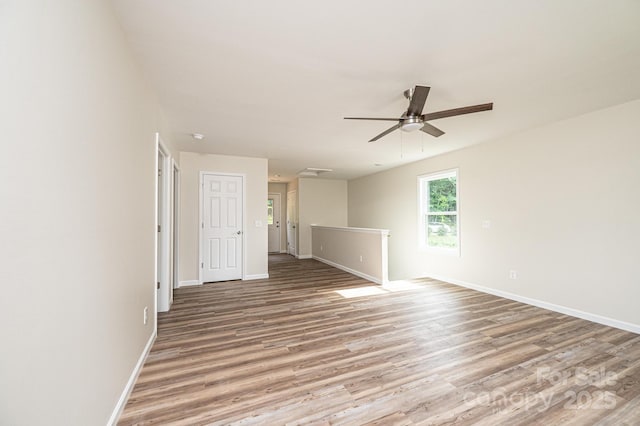 1214 Winter Pl SW, Lenoir, NC 28645 - empty room with ceiling fan and light wood-style floors