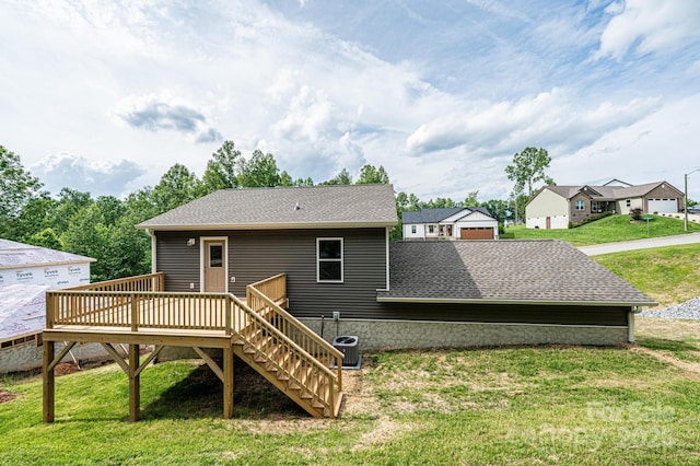 1214 Winter Pl SW, Lenoir, NC 28645 - rear view of house with a deck, a lawn, stairs, and a shingled roof