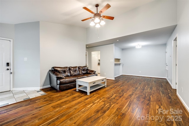 1606 Sharon Rd W Unit 40, Charlotte, NC 28210 - living room with a ceiling fan, wood finished floors, and a towering ceiling