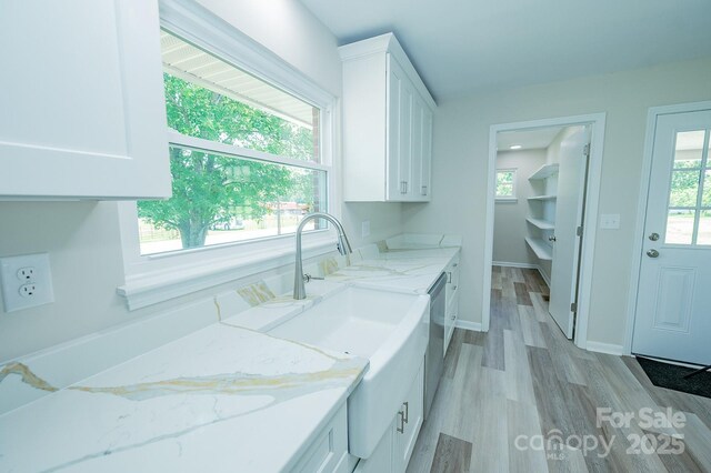 1696 Race Path Church Rd, Mooresboro, NC 28114 - laundry area featuring light wood-type flooring and baseboards