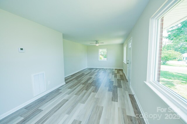 1696 Race Path Church Rd, Mooresboro, NC 28114 - spare room with light wood finished floors and ceiling fan
