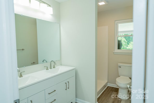 1696 Race Path Church Rd, Mooresboro, NC 28114 - full bath with double vanity, wood finished floors, and a shower