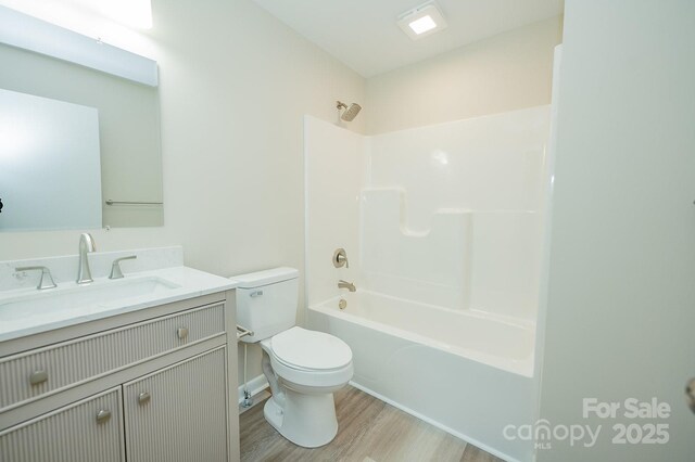 1696 Race Path Church Rd, Mooresboro, NC 28114 - bathroom featuring wood finished floors, vanity, and shower / washtub combination