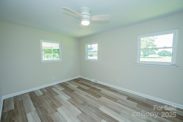1696 Race Path Church Rd, Mooresboro, NC 28114 - empty room with ceiling fan and light wood-style flooring