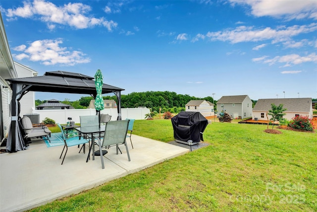 410 Apex Cir, Shelby, NC 28152 - fenced backyard with a gazebo, a patio, and outdoor dining area
