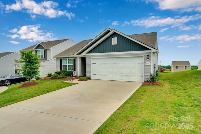410 Apex Cir, Shelby, NC 28152 - view of front of property featuring board and batten siding, a garage, a front lawn, and concrete driveway
