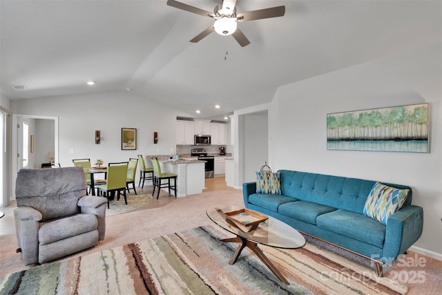 410 Apex Cir, Shelby, NC 28152 - living area featuring vaulted ceiling, ceiling fan, light carpet, and recessed lighting