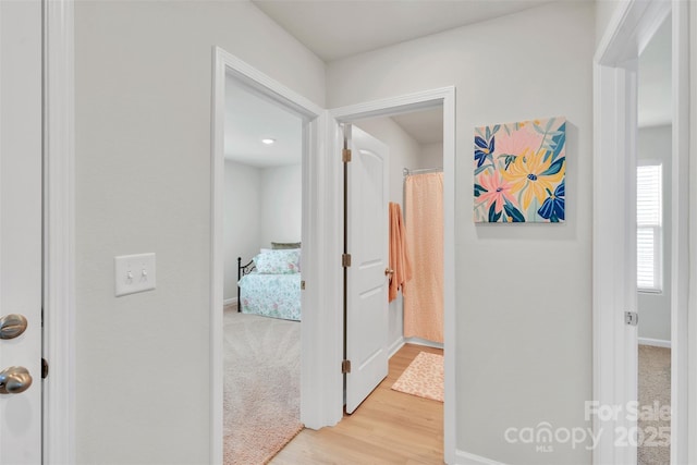 410 Apex Cir, Shelby, NC 28152 - hallway featuring baseboards and light wood-type flooring