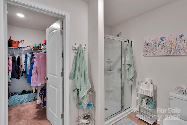 410 Apex Cir, Shelby, NC 28152 - bathroom featuring a stall shower and a spacious closet