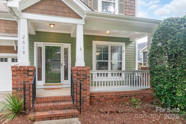 2619 Merion Hills Ct, Charlotte, NC 28269 - doorway to property with covered porch and brick siding