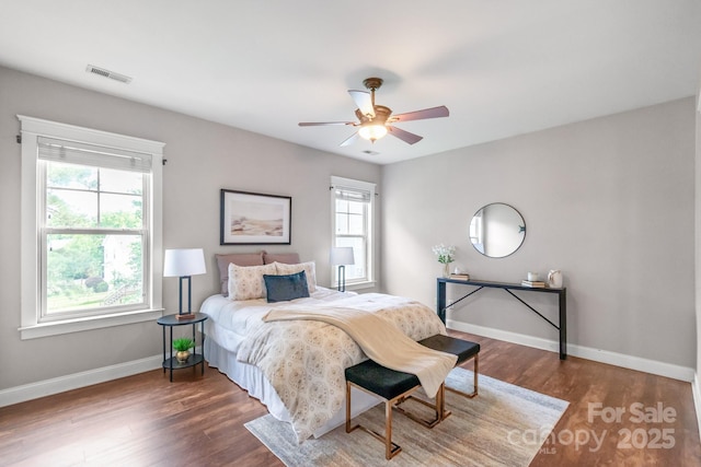 2619 Merion Hills Ct, Charlotte, NC 28269 - bedroom with wood finished floors and a ceiling fan