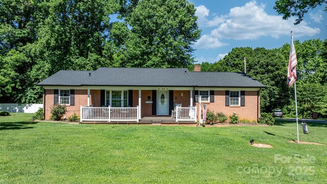 135 Burton Hills Cir, Gastonia, NC 28054 - single story home featuring a porch, brick siding, and a chimney