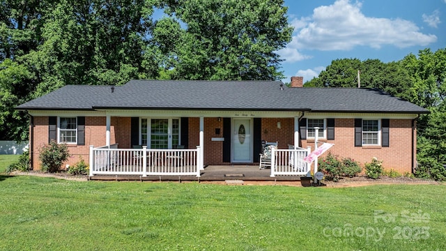 135 Burton Hills Cir, Gastonia, NC 28054 - ranch-style home featuring a porch, a front yard, and brick siding