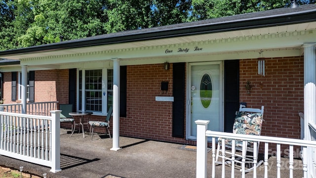 135 Burton Hills Cir, Gastonia, NC 28054 - entrance to property with covered porch and brick siding