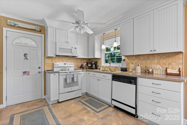 135 Burton Hills Cir, Gastonia, NC 28054 - kitchen with white appliances, a ceiling fan, backsplash, white cabinetry, and decorative light fixtures