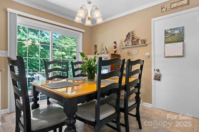 135 Burton Hills Cir, Gastonia, NC 28054 - dining room featuring crown molding and a chandelier