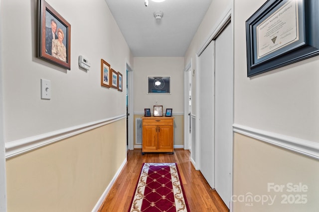 135 Burton Hills Cir, Gastonia, NC 28054 - hallway featuring light wood-style floors and baseboards
