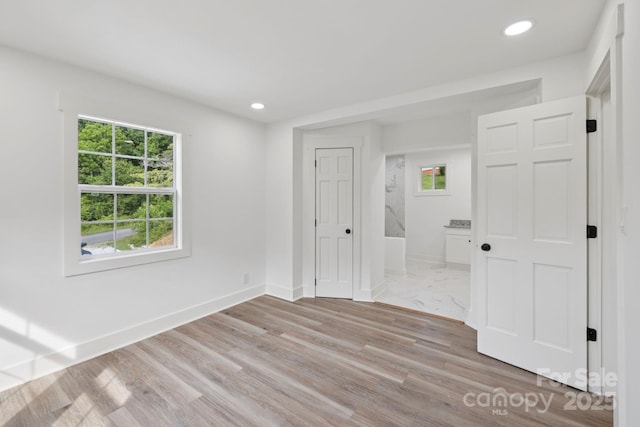 431 Pole Miller Ext, Brevard, NC 28712 - unfurnished bedroom with light wood finished floors and recessed lighting