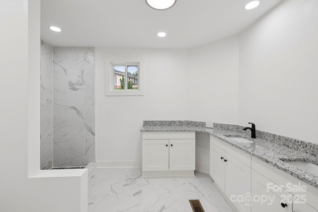 431 Pole Miller Ext, Brevard, NC 28712 - bathroom featuring marble finish floors, double vanity, recessed lighting, and a marble finish shower