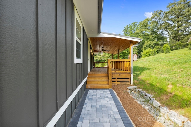 431 Pole Miller Ext, Brevard, NC 28712 - wooden terrace featuring a ceiling fan and a yard