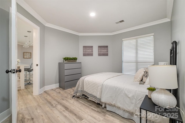 8135 Cedar Glen Dr, Charlotte, NC 28212 - bedroom with crown molding and light wood-style floors