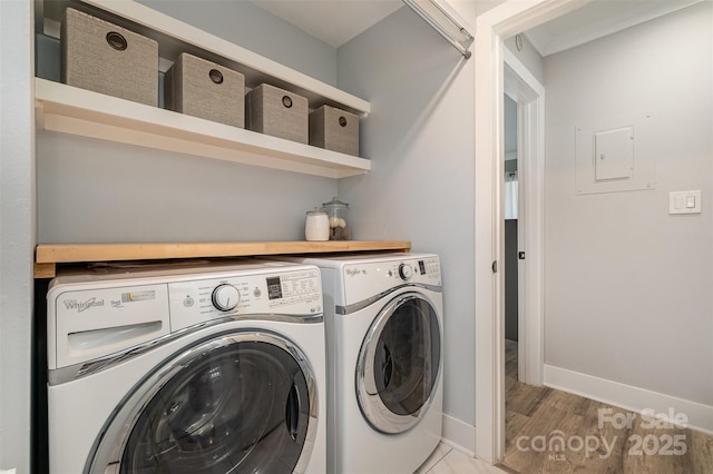 8135 Cedar Glen Dr, Charlotte, NC 28212 - laundry area with washing machine and dryer and light wood-style floors
