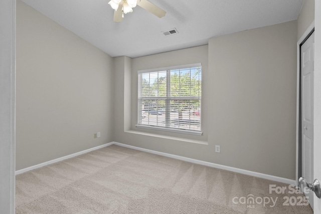 12516 Hennigan Place Ln, Charlotte, NC 28214 - carpeted empty room with baseboards and ceiling fan