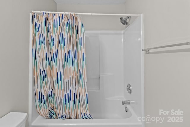 12516 Hennigan Place Ln, Charlotte, NC 28214 - full bathroom with shower / bath combo with shower curtain and toilet
