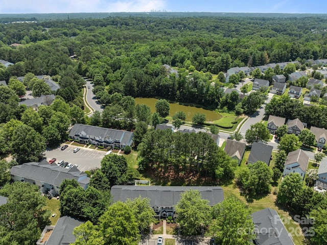 12516 Hennigan Place Ln, Charlotte, NC 28214 - aerial view of residential area featuring a heavily wooded area