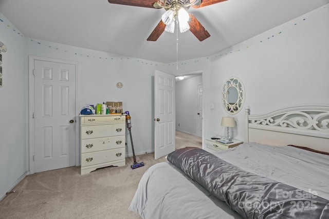 212 Foxfield Ln, Matthews, NC 28105 - bedroom with light colored carpet and a ceiling fan