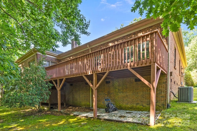 212 Foxfield Ln, Matthews, NC 28105 - back of house with brick siding and a deck