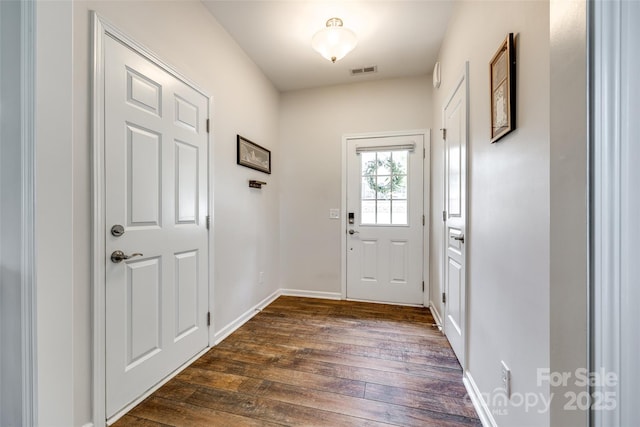 4107 Park S Station Blvd, Charlotte, NC 28210 - doorway featuring dark wood-style floors and baseboards