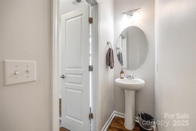 4107 Park S Station Blvd, Charlotte, NC 28210 - bathroom featuring a sink and wood finished floors