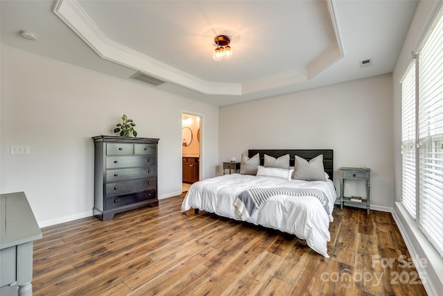 4107 Park S Station Blvd, Charlotte, NC 28210 - bedroom featuring a tray ceiling, wood finished floors, and ensuite bathroom