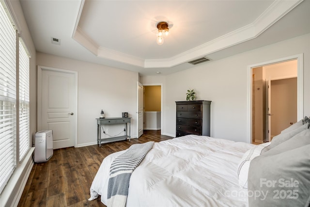 4107 Park S Station Blvd, Charlotte, NC 28210 - bedroom featuring a tray ceiling, dark wood-style flooring, and crown molding