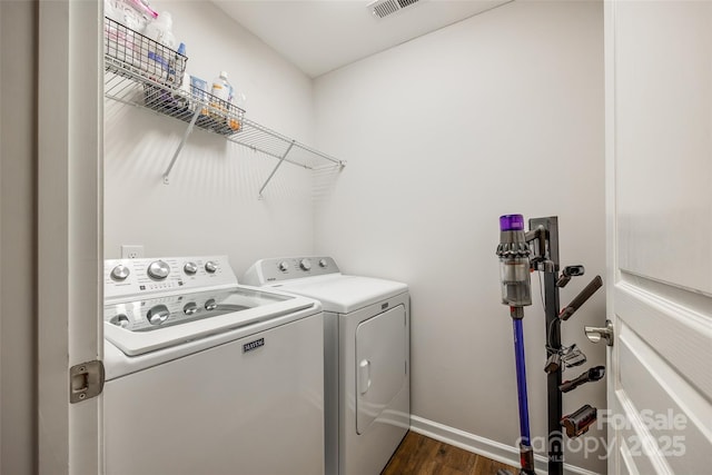 4107 Park S Station Blvd, Charlotte, NC 28210 - laundry room featuring separate washer and dryer and dark wood finished floors