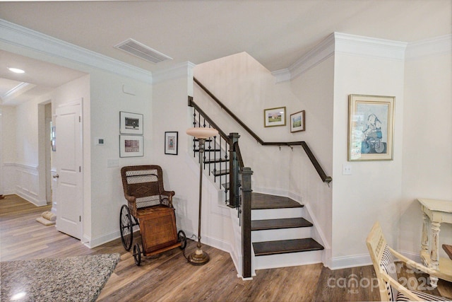 8042 Saluda Dr Unit 3, Charlotte, NC 28269 - stairs with wood finished floors and ornamental molding