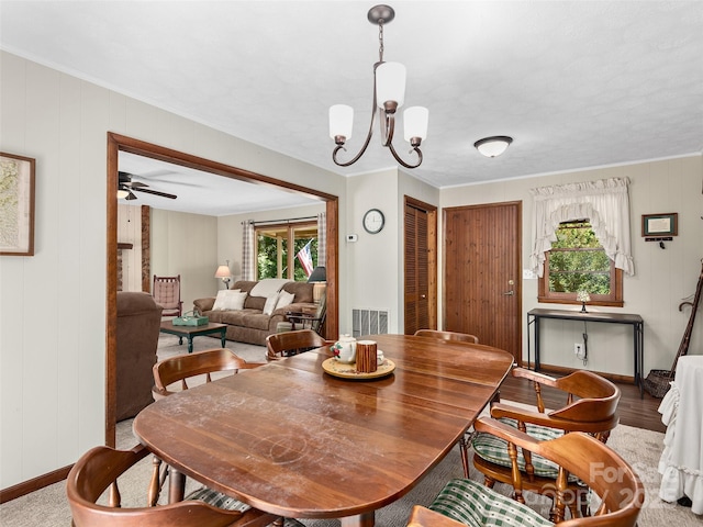 185 Indian Springs Rd, Clyde, NC 28721 - dining area featuring a chandelier and a ceiling fan