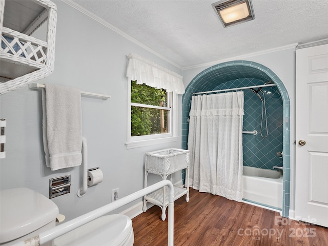 185 Indian Springs Rd, Clyde, NC 28721 - bathroom featuring shower / bath combo, wood finished floors, ornamental molding, and a textured ceiling