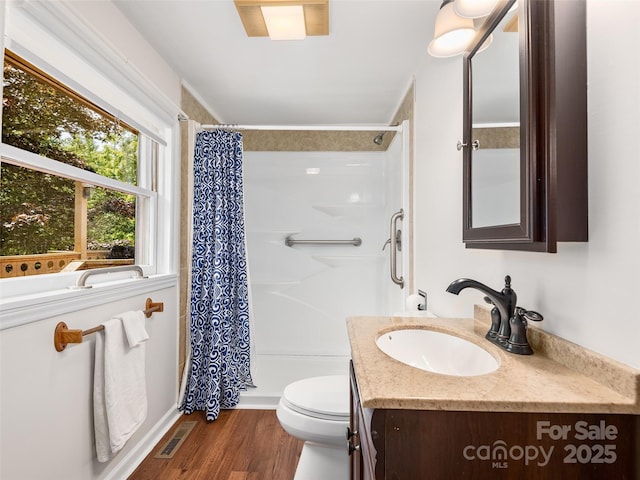 185 Indian Springs Rd, Clyde, NC 28721 - bathroom with vanity, a shower stall, and wood finished floors