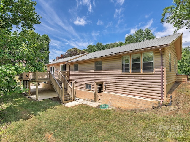 185 Indian Springs Rd, Clyde, NC 28721 - back of property with a deck, a yard, stairway, and a metal roof
