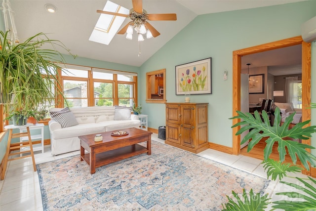 76 Woodland Hills Rd, Asheville, NC 28804 - living room featuring ceiling fan, lofted ceiling, light tile patterned floors, plenty of natural light, and a skylight