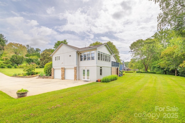 76 Woodland Hills Rd, Asheville, NC 28804 - view of side of home with stairway, a garage, driveway, and a lawn