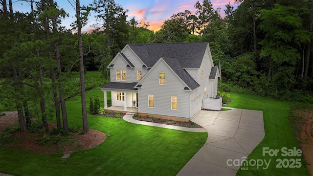 3222 Player Ct, Salisbury, NC 28144 - view of front of property with concrete driveway, roof with shingles, covered porch, and a yard